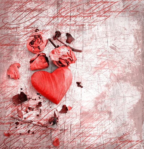 Heart as a symbol of love, vintage card with red heart and dry roses on grunge old background — Stock Photo, Image