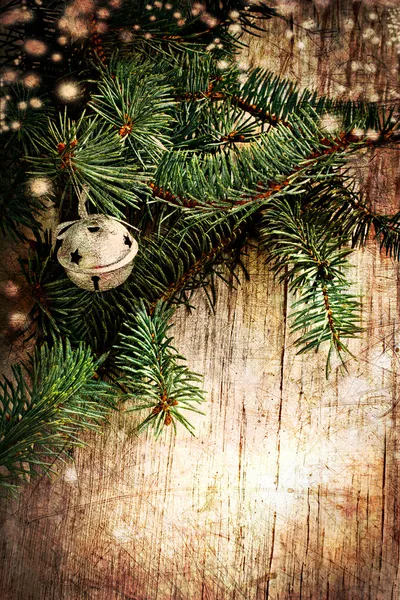 Vintage christmas decorations with christmas tree and wooden background — Zdjęcie stockowe