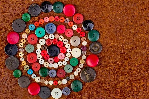 Set of vintage buttons on old wooden table — Stock Photo, Image