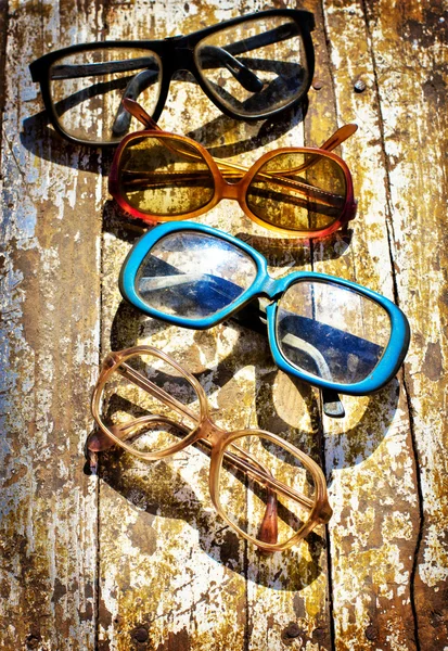 Close-up of retro glasses against vintage background — Stock Photo, Image