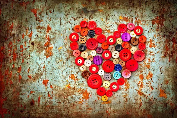 Red heart background on vintage old surface — Stock Photo, Image