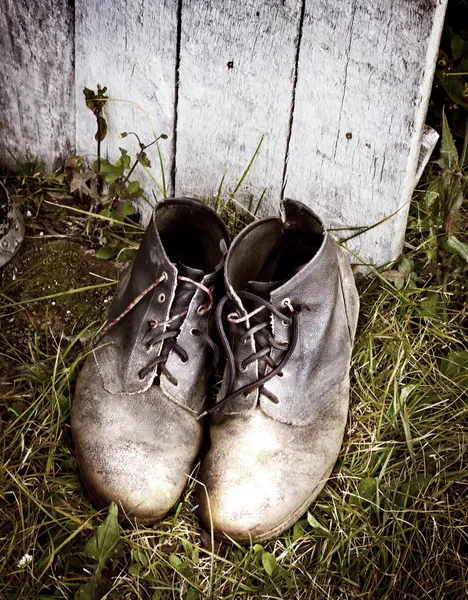 Botas sucias viejas — Foto de Stock