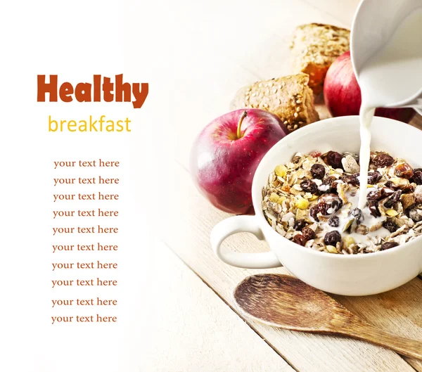 Bowl of oat flake with raisins, milk and apples — Stock Photo, Image
