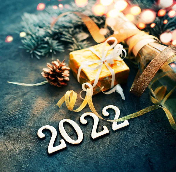Boldog Évet 2022 Háttér Ünnepek Kártya Fényes Fények Ajándékok Üveg Stock Kép
