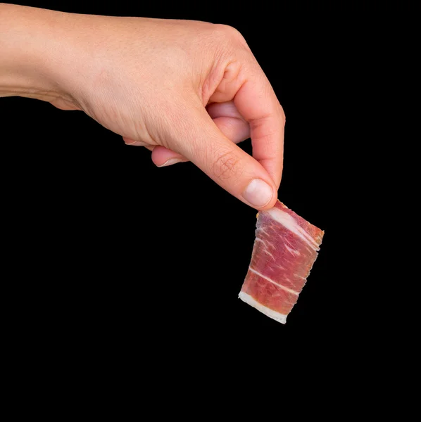 Plukken serrano ham — Stockfoto