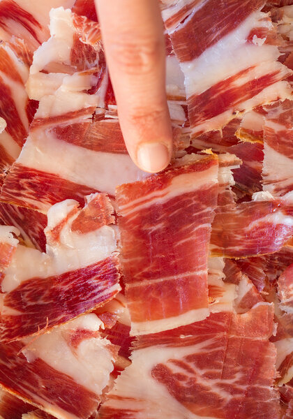 Picking serrano ham