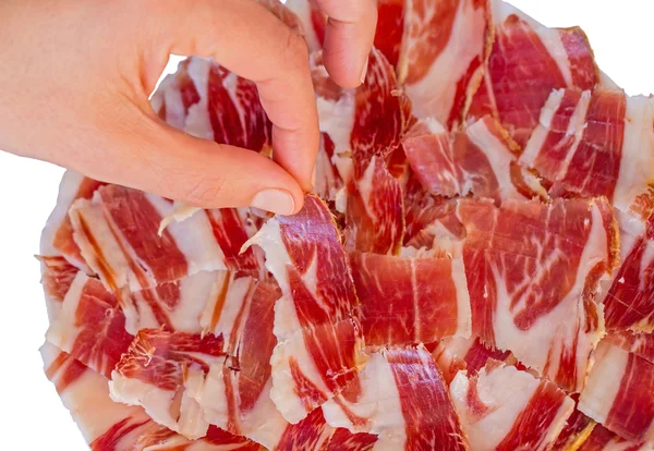 Picking serrano ham — Stock Photo, Image
