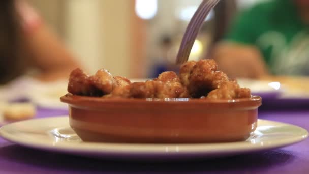 Closeup of fork and delicious sweetbread plate — Stock Video