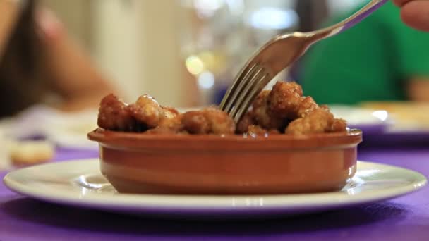 Closeup of fork and delicious sweetbread plate — Stock Video