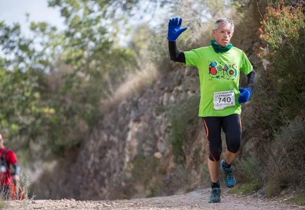 Carrera de montaña dura —  Fotos de Stock