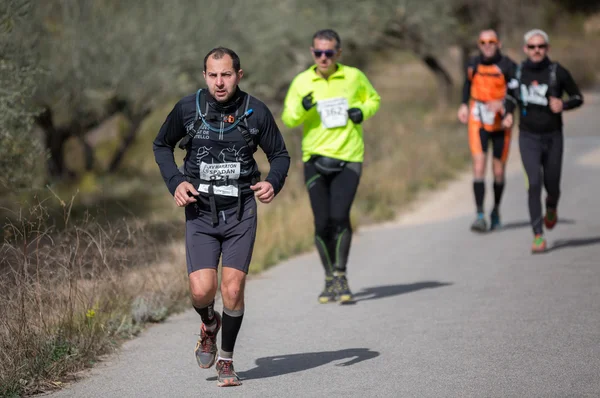 Maratona dura corrida de montanha, estrada — Fotografia de Stock