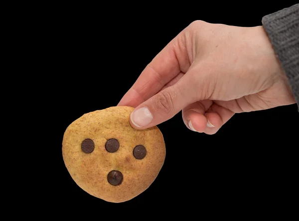 Bolinho de abóbora e mão — Fotografia de Stock