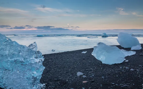 Blue icebergs and sea