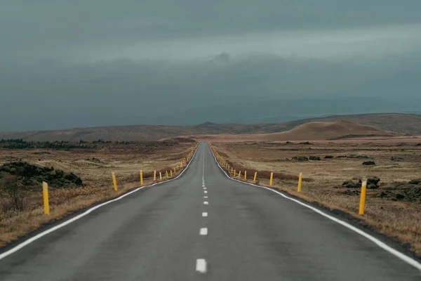 Empty straight road under the clouds for text space — Stock Photo, Image