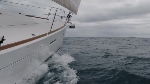 Sailing ship sailing into the waves in slow-mo — Stock Video