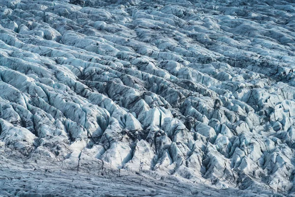 Massiccia texture del ghiacciaio sfondo, colpo lungo con crepe — Foto Stock