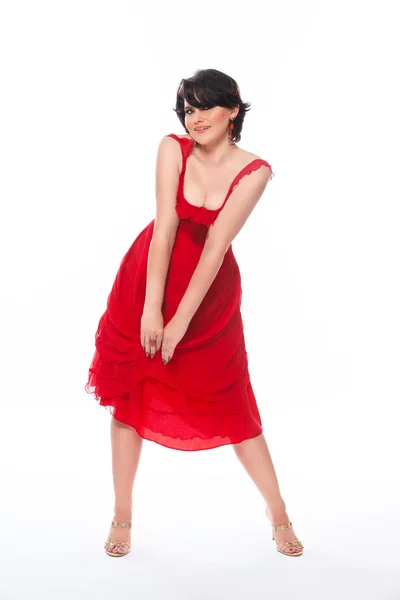 Kaunis nainen punaisessa mekossa — kuvapankkivalokuva
