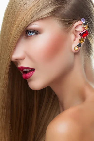 Girl with big crystal earring Stock Image