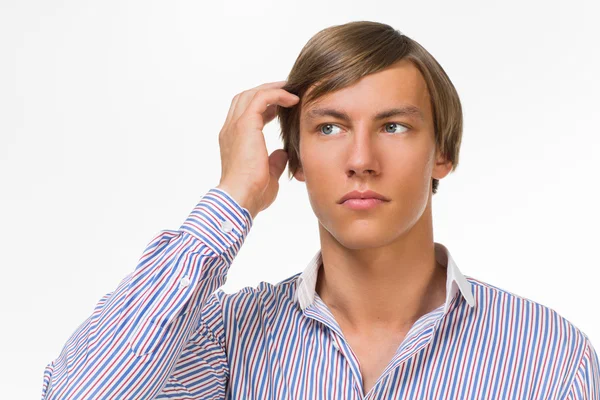 Young man thinking of something — Stock Photo, Image