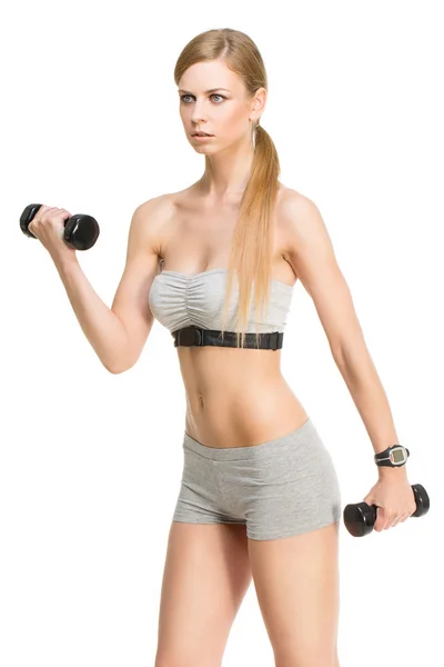 Sporty girl with dumbbells Stock Picture