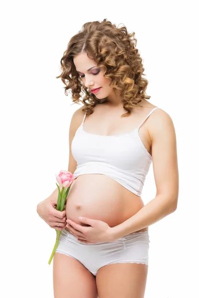 Femeie gravidă cu flori — Fotografie, imagine de stoc