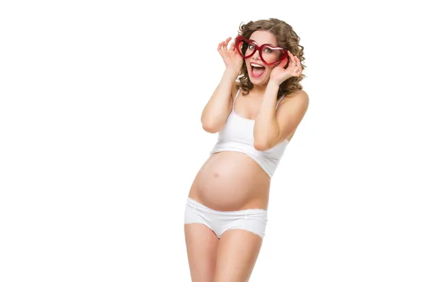 Беременная женщина в очках — стоковое фото