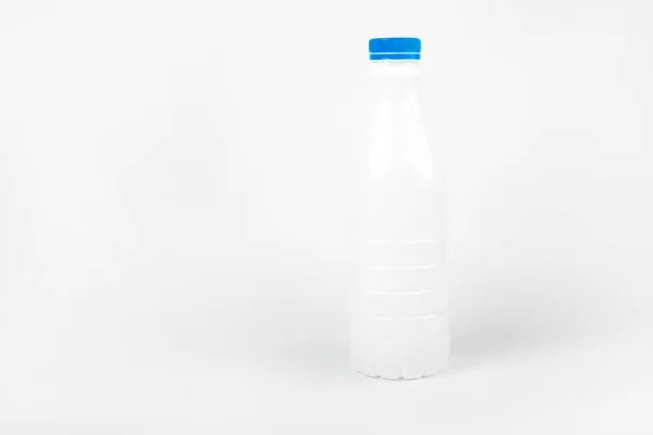 White blank plastic bottle on white background