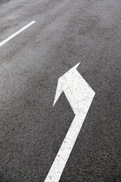 Arrow on the road — Stock Photo, Image