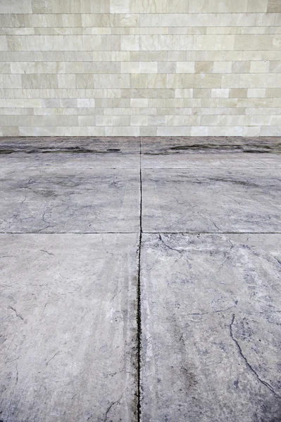 Stone wall and concrete floor — Stock Photo, Image