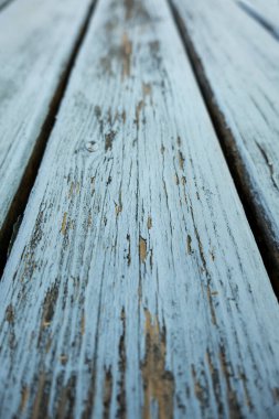 Zaman geçtikçe boyanmış ve hasar görmüş eski ahşabın ayrıntıları