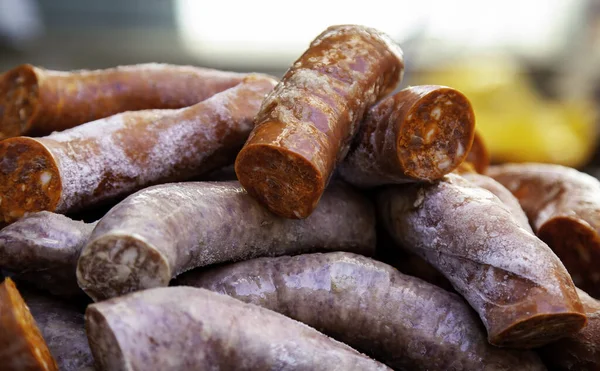 Detail of sausage meat, unhealthy and greasy food, pork