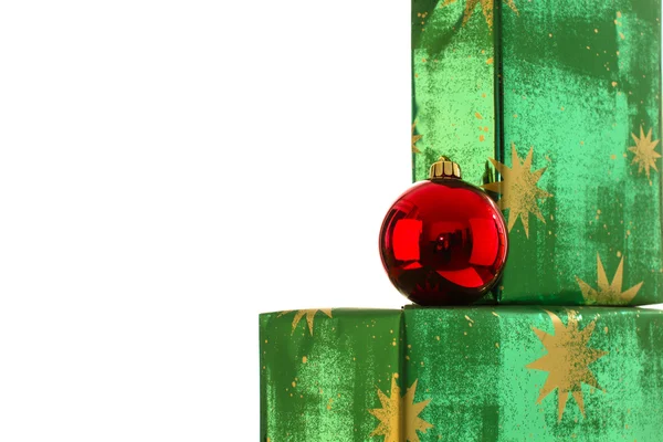 Red bulb & green gifts — Stock Photo, Image