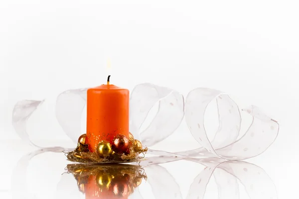 Оранжевая свеча — стоковое фото