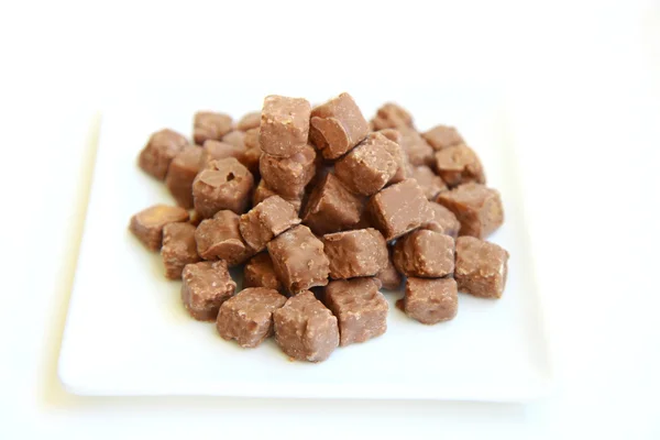 Čokoládové a oříškové potažené krutony — Stock fotografie