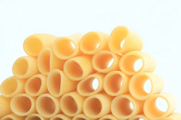 Macaroni in row — Stock Photo, Image