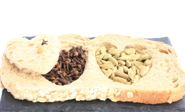 Integral bread and spices — Stock Photo, Image