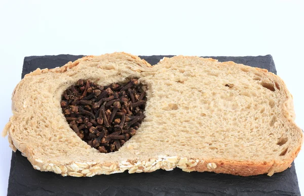 Bread with clove — Stock Photo, Image