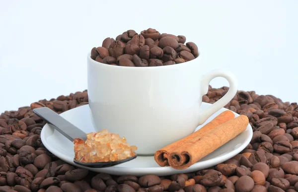 Coffee with sugar and cinnamon — Stock Photo, Image