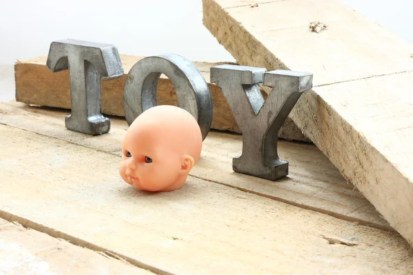 Head and toy — Stock Photo, Image