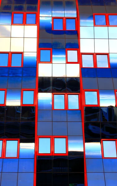 Red windows in high tower — Stock Photo, Image