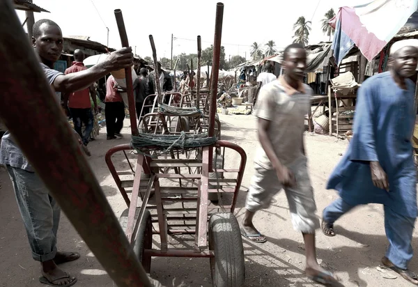 Wheel barrows in Ziguinchor market — Stock Photo, Image