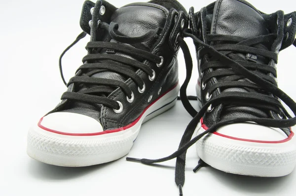 Чёрные кроссовки — стоковое фото