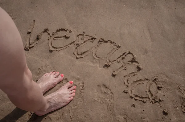 Schrijven in het zand — Stockfoto