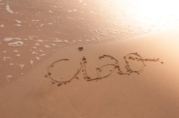 Bye written on sand — Stock Photo, Image
