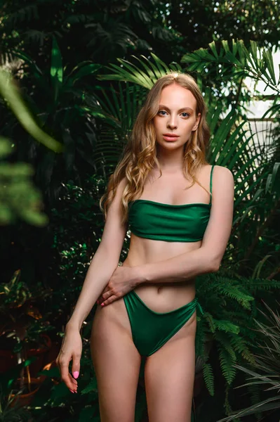 Attractive Blonde Woman Green Swimsuit Tropical Forest — Zdjęcie stockowe