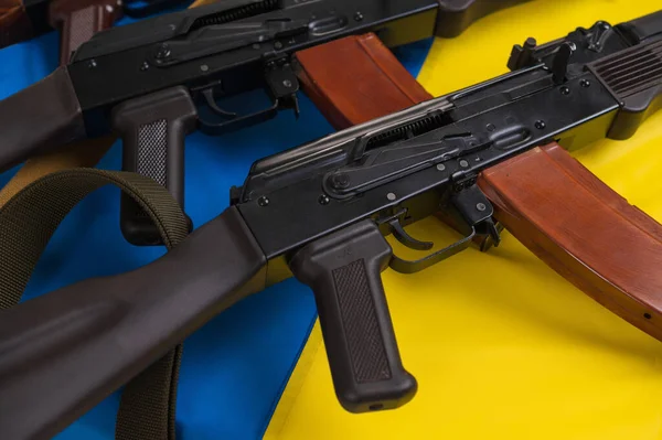 Three Loaded Kalashnikov Assault Rifles Blue Yellow Flag Ukraine — Stok fotoğraf