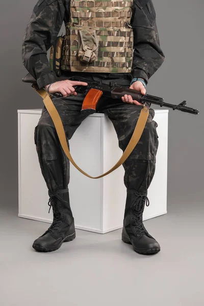Soldier Sits Protective Mask Uniform — Photo