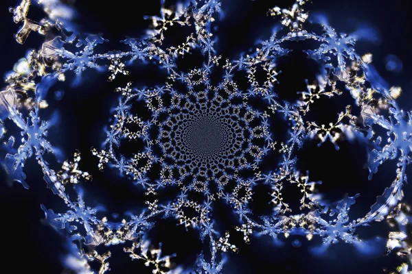 雪の結晶の万華鏡のようなマイクロ写真 — ストック写真