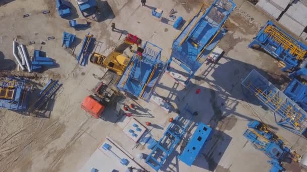 Modern industrial construction of a large industrial plant. View from the air. Construction crane, construction machinery. — Stock Video
