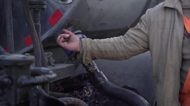Man pulling the lever on a plant. Close-up of mechanic pulling the gear — Stock Video